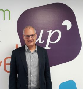 Stephane Baudouin, Data Architect posing within UpCRM premises